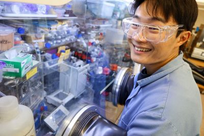 Smiling graduate student with protective eyewear
